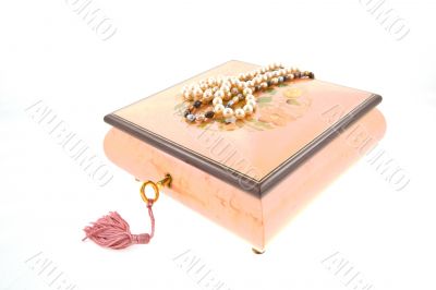 pearl necklaces on encrusted box