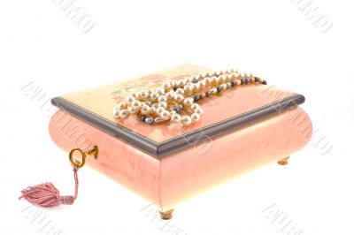 pearl necklaces on encrusted box