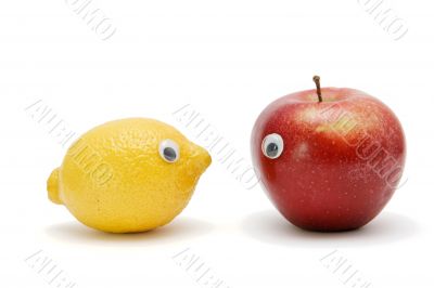 Funny lemon and apple with eyes Funny lemon and apple with eyes