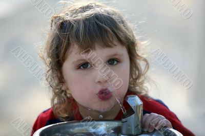 Two boys by the drinking fountain