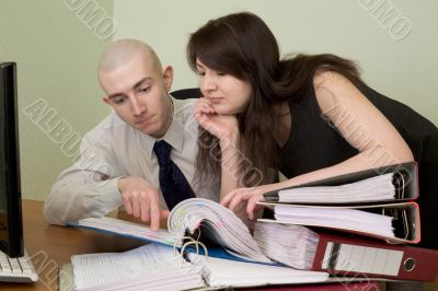 Bookkeeper and the secretary on a workplace Bookkeeper and the secretary on a workplace