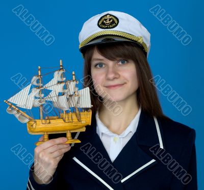 Woman with uniform cap and the ship