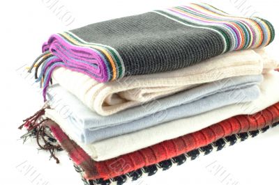 selection of six wool different scarves