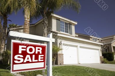 Red For Sale Real Estate Sign and House