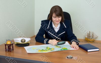 Woman in uniform with geographic map Woman in uniform with geographic map
