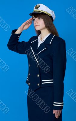 Girl in a sea uniform salutes