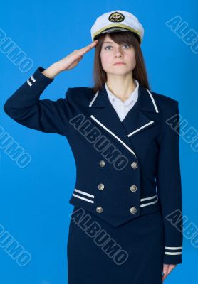 Girl in a sea uniform salutes