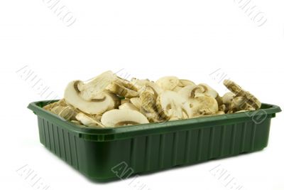 Sliced champignon mushrooms in green pack Sliced champignon mushrooms in green pack