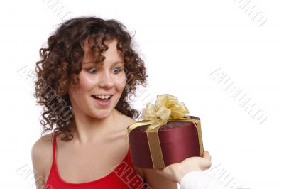 Surprise. Woman with gift.