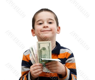 Cute little boy holds banknotes