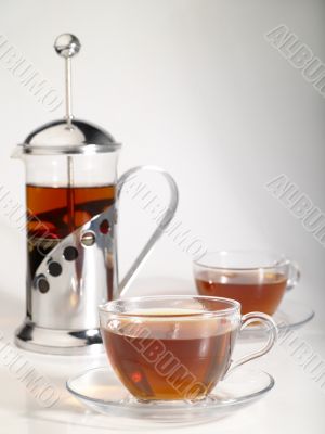 french-press with pair cups of tea