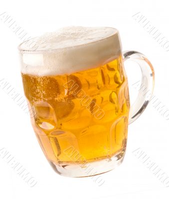 Alcohol light beer mug with froth and bubbles