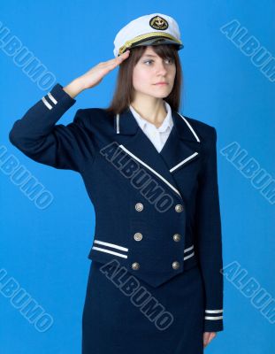 Girl in a sea uniform salutes