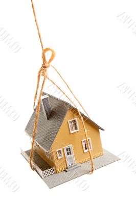 House Hanging by a String