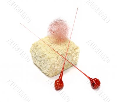Sweet biscuit cake with two lollipop