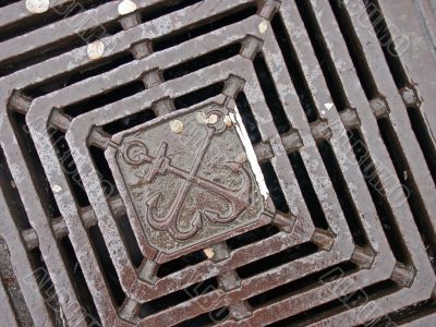 Coat of arms on the grate