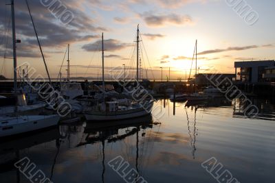 Boats on the pier at sunset