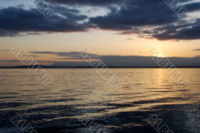 Sunset over the water