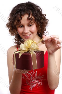 Surprise. Woman with gift.