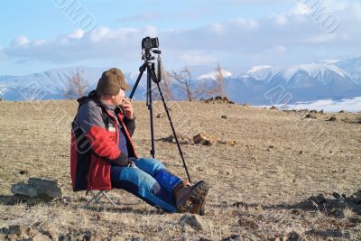 adventure photographer in the mountains