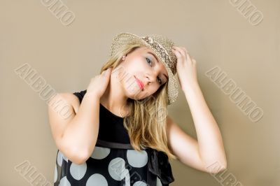 blonde in straw hat smiling blonde in straw hat smiling