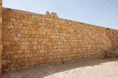 Ancient yellow stone wall Ancient yellow stone wall
