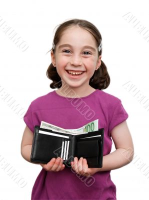 Smiling little girl holds wallet with money