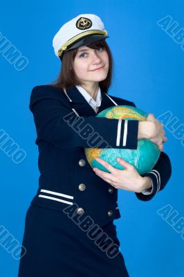 Girl in uniform embrace globe