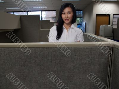 Woman in cubicle