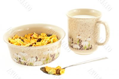 cornflakes with milk in a cup cornflakes with milk in a cup