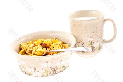 cornflakes with milk in a cup cornflakes with milk in a cup