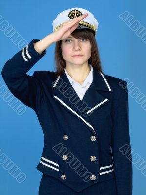 Girl in a sea uniform salutes