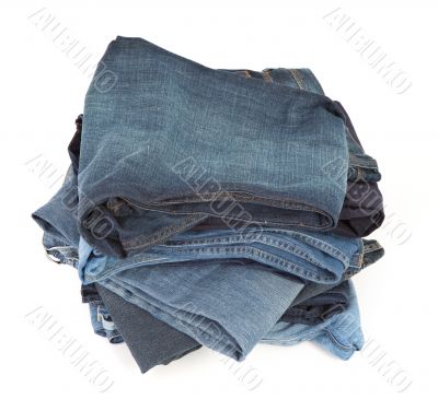 stack of blue jeans