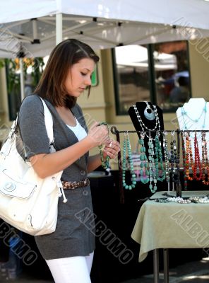 Girl buying jewelry