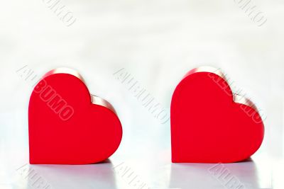 Two red hearts isolated