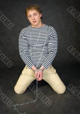 Young man shackled Young man shackled