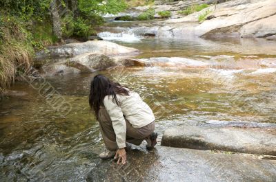 woman next to river