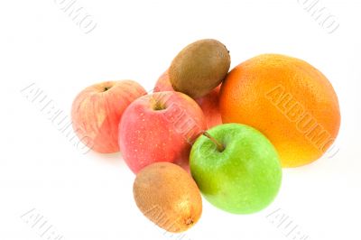 different fruits: apples, grapefruit, kiwi-fruits on a white bac