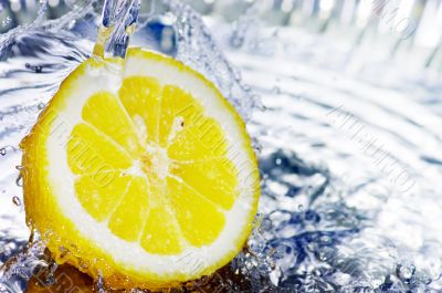 fresh water drops on lemon