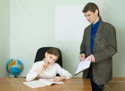 Teacher and girl with tablet