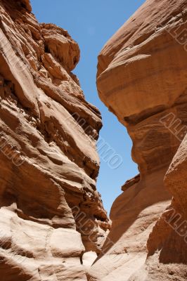 Narrow slot between two red rocks