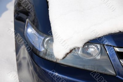 Snow covering a headlight