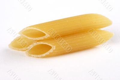 italian pasta - penne rigate background horizontal