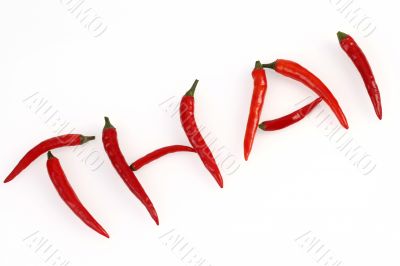 red hot chilis arranged to spell THAI
