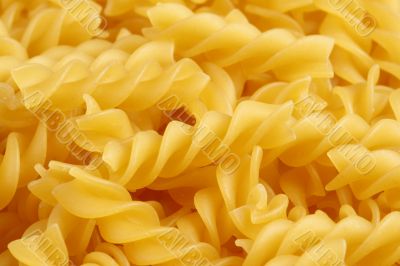 Italian pasta - fusilli background horizontal