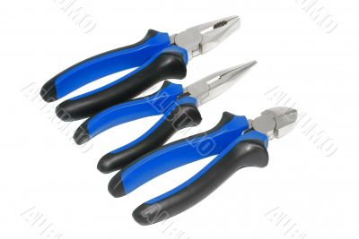 Three electricians tool: pliers on a white background.