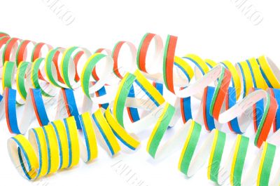 Colorful party streamers on white background