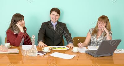 Business team sits at the table Business team sits at the table