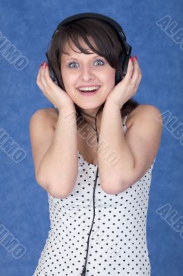 Girl listening music in earphones
