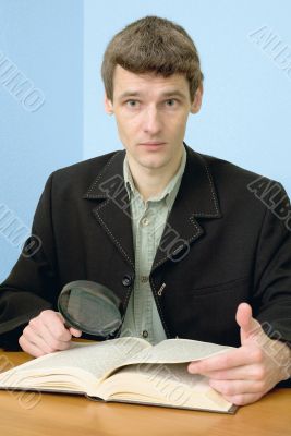 Man read book on a workplace Man read book on a workplace